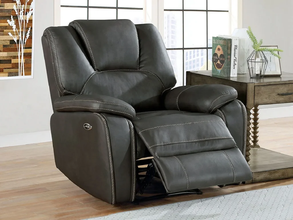 black colored power recliner with button to recliner